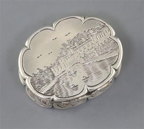 A Victorian silver cusped oval vinaigrette by Edward Smith, the lid engraved with country estate and river,